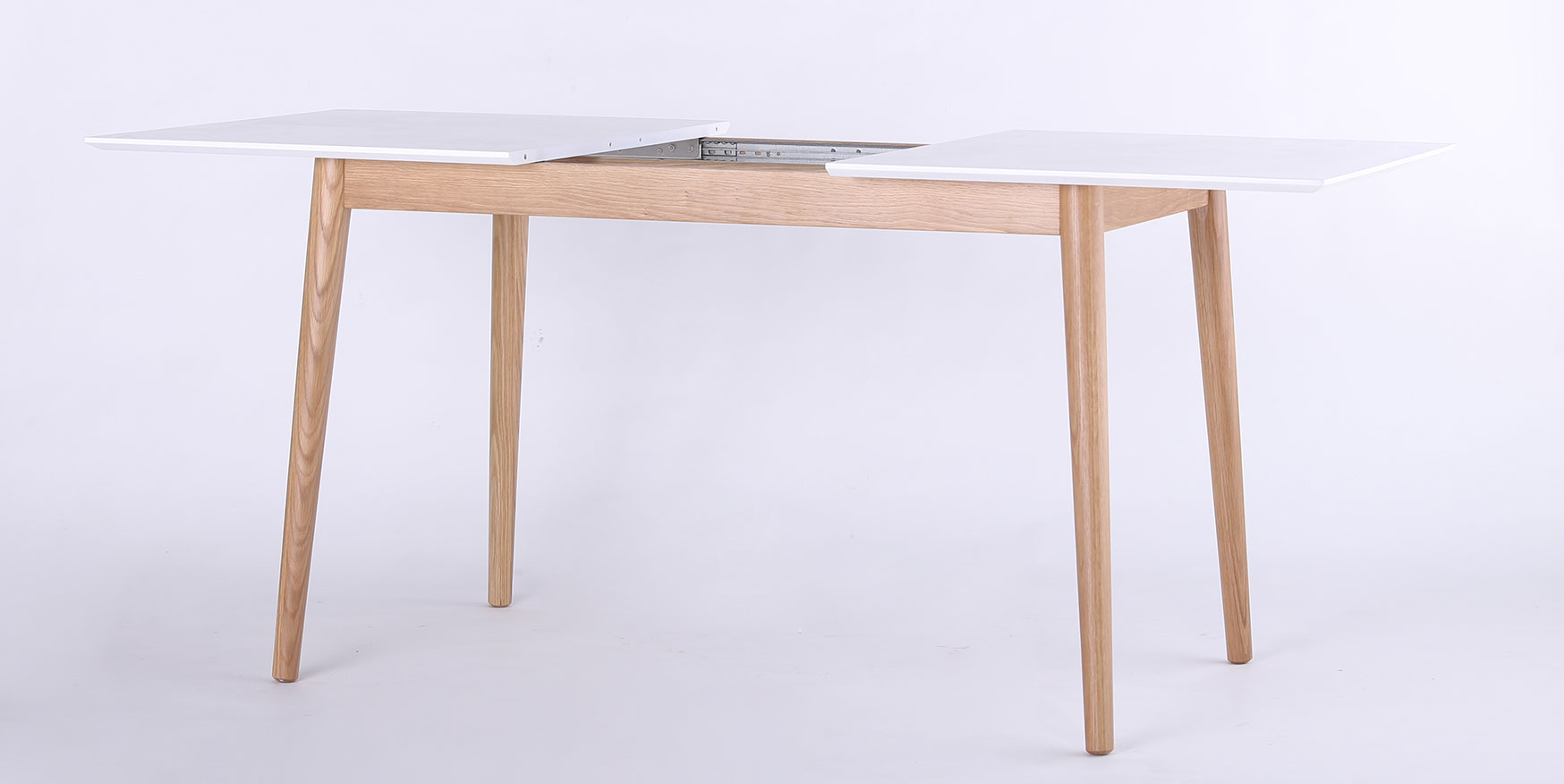 modern round extendable dining table
